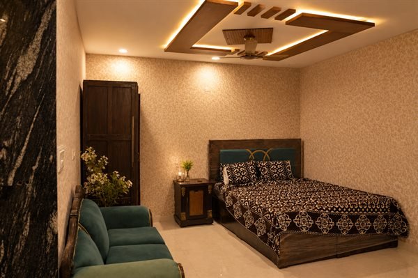 Private air-conditioned bridal and groom dressing suite with bedroom and lounge seating